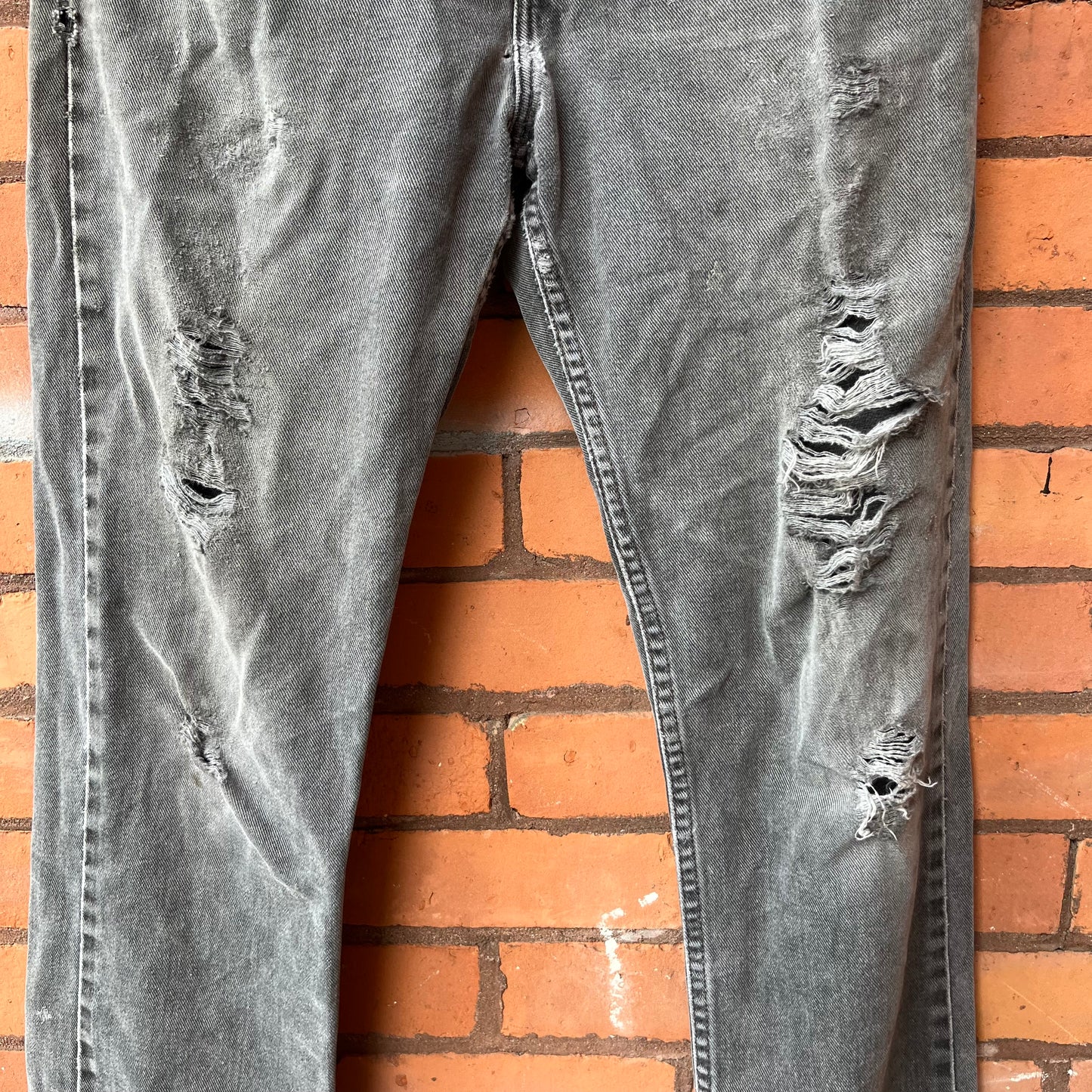 90’s Vintage Faded Grey Thrashed Levi’s 505 Jeans / 30 Waist