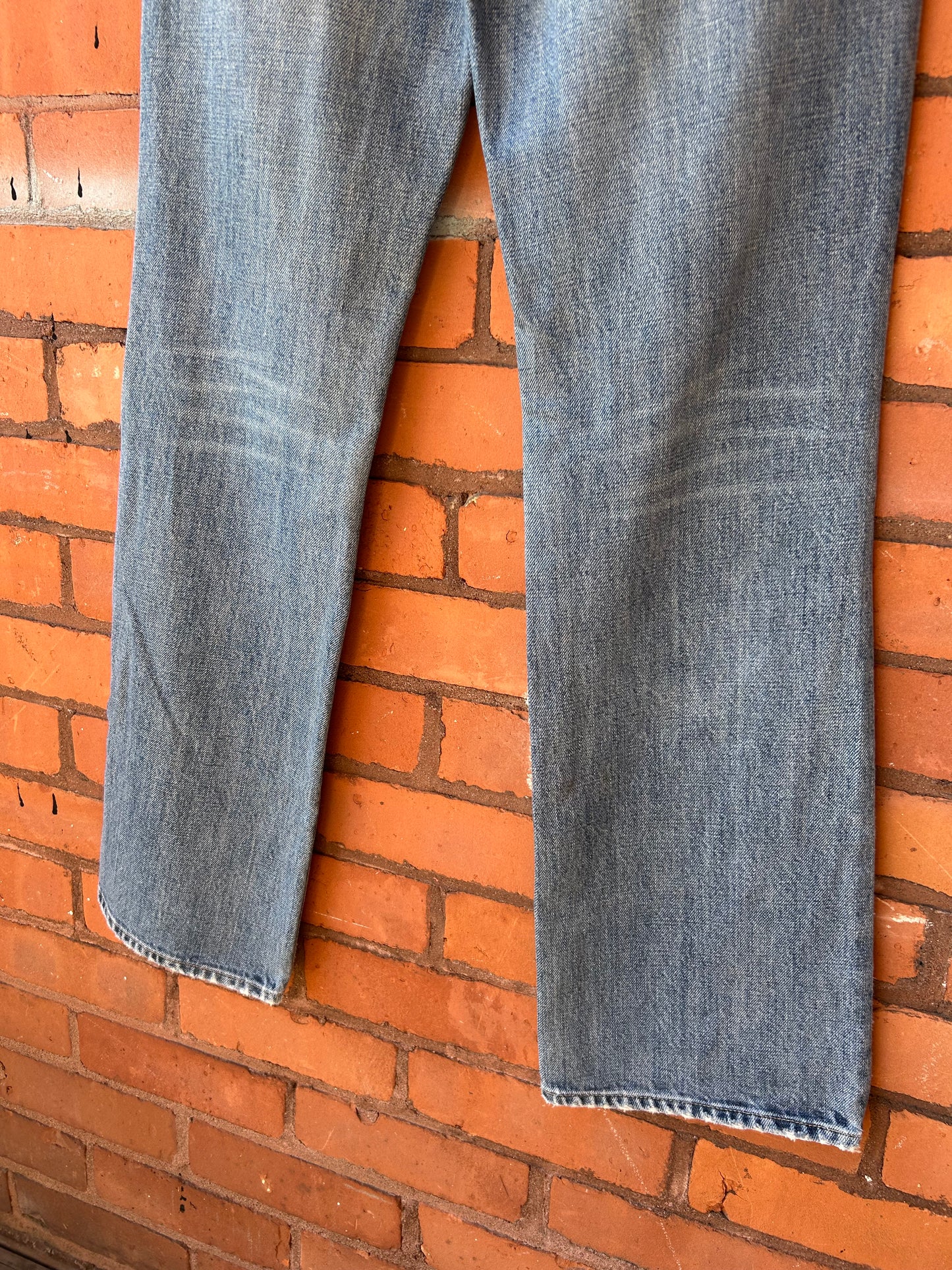 90’s Vintage Faded Blue Mid Rise Boot Cut Jeans / 28 Waist