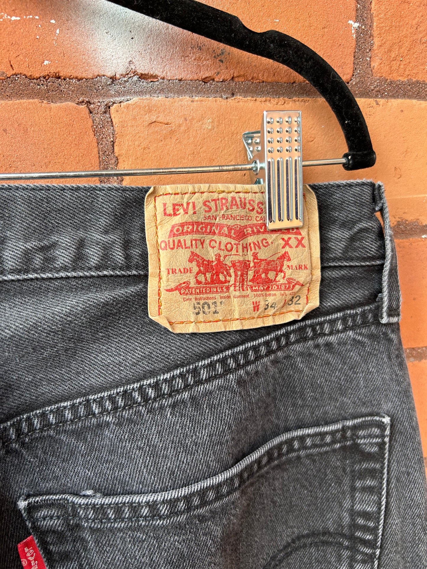 90’s Vintage Levi’s Faded Black 501 Straight Leg Jeans / 32 Waist