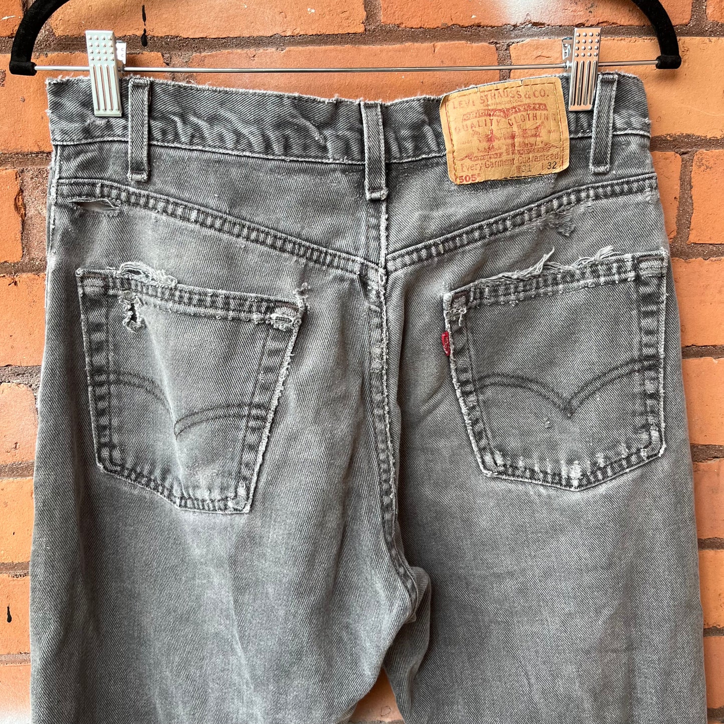 90’s Vintage Faded Grey Thrashed Levi’s 505 Jeans / 30 Waist