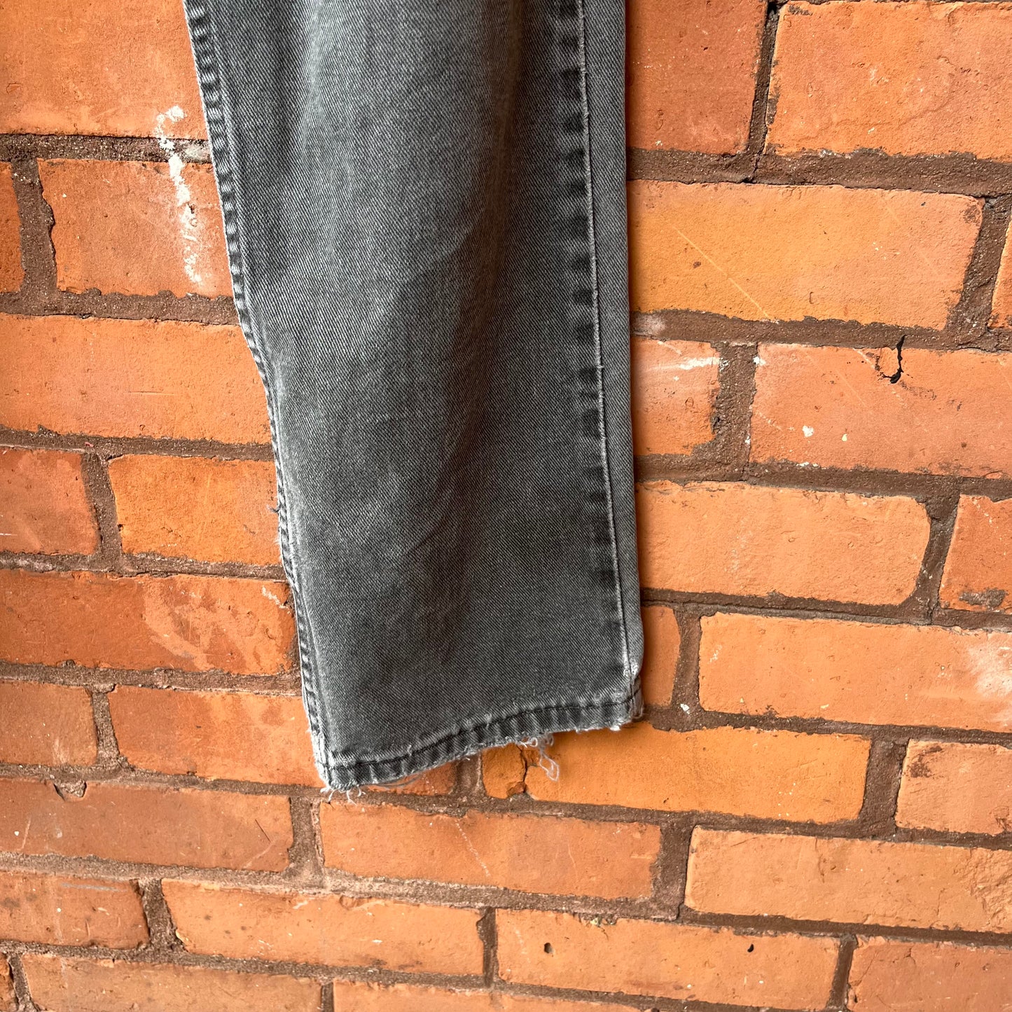 90’s Vintage Faded Grey Thrashed Levi’s 505 Jeans / 30 Waist