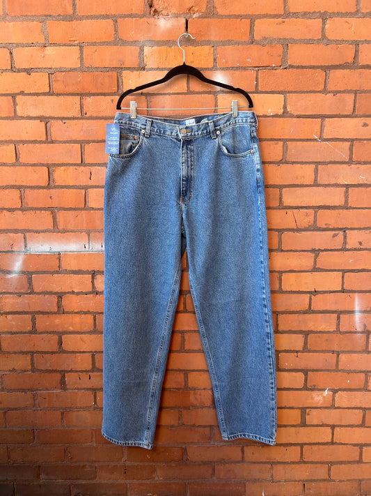 90’s Vintage Calvin Klein Faded Blue Baggy Jeans / 36 Waist