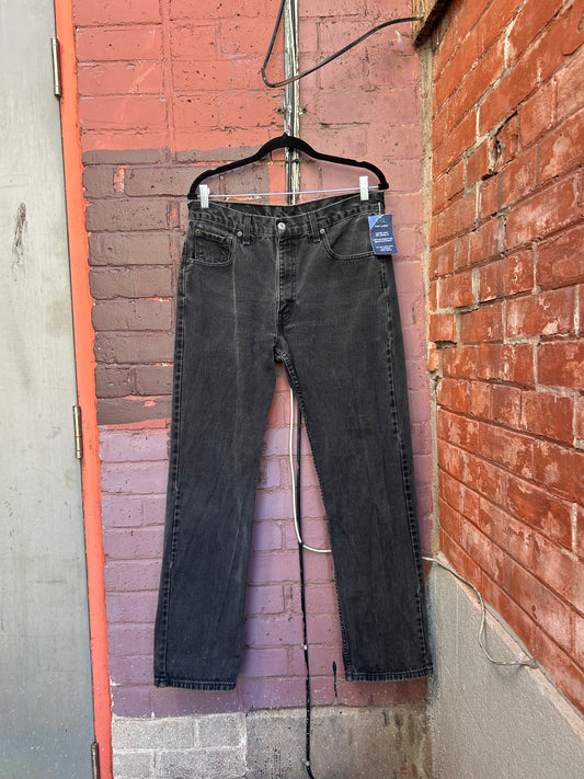 90’s Vintage Levi’s Faded Black 505 Straight Leg Jeans / 34 Waist