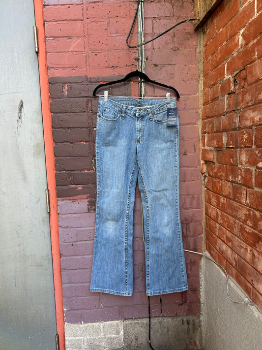 90's Vintage Lee Riders Low Rise Light Wash Flare Jeans / 30 Waist